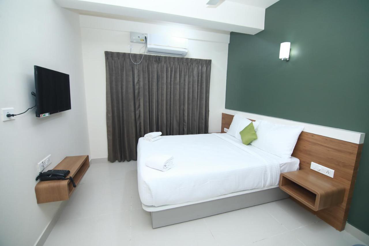 Hotel Royal Blooms Bangalore Extérieur photo