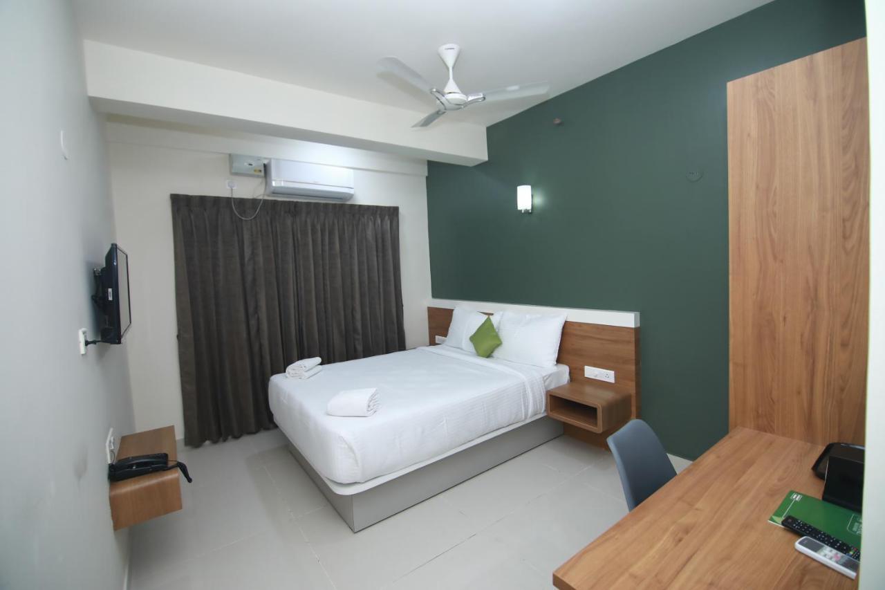 Hotel Royal Blooms Bangalore Extérieur photo