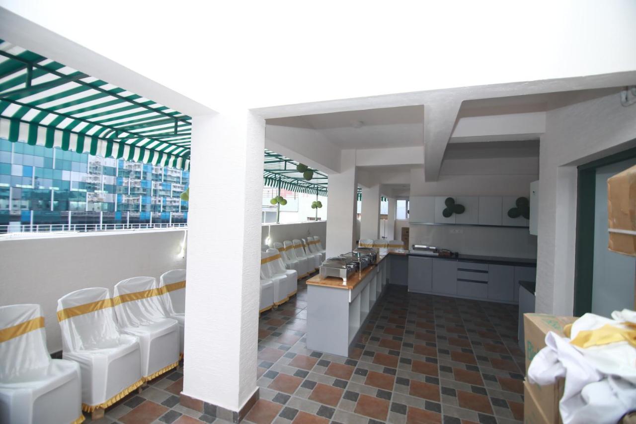Hotel Royal Blooms Bangalore Extérieur photo